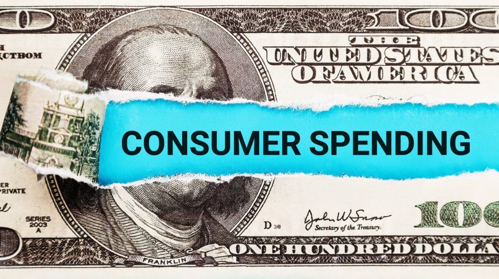 The word Consumer Spending in the background of the US dollar. Consumerism, Retail, and Economic Consumption Concept.